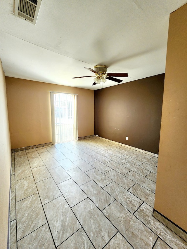 empty room with ceiling fan