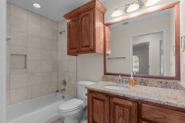 full bath with toilet, washtub / shower combination, and vanity