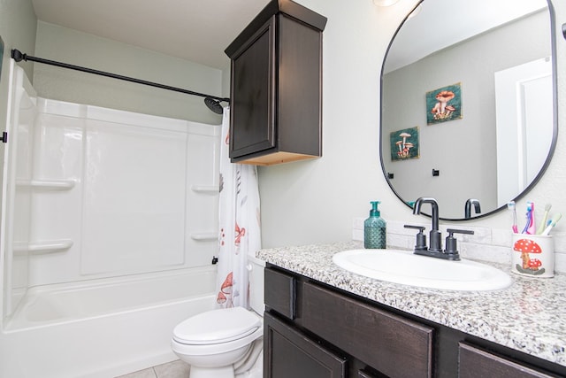 full bathroom with tile patterned floors, shower / bathtub combination with curtain, vanity, and toilet