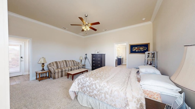 bedroom with connected bathroom, visible vents, and ornamental molding