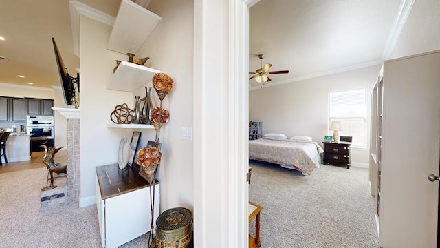 bedroom with recessed lighting, baseboards, light colored carpet, and crown molding