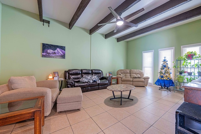 tiled living room with beam ceiling and ceiling fan