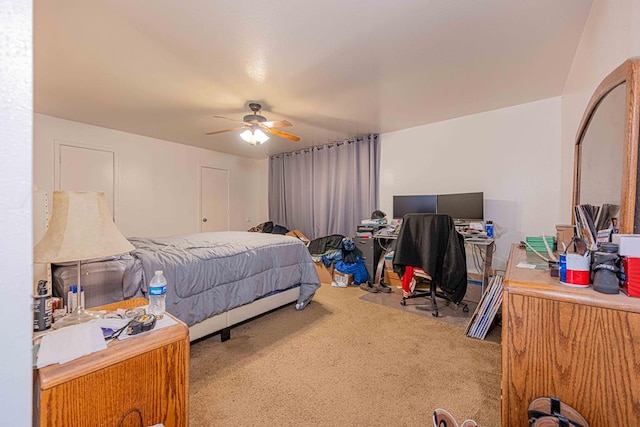 bedroom with ceiling fan and carpet floors