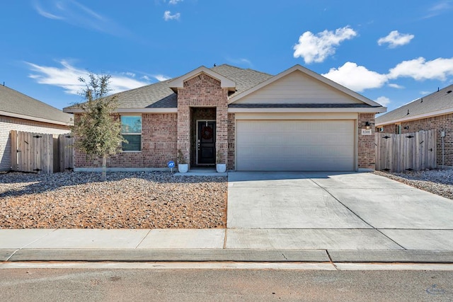 ranch-style home featuring a garage, a shingled roof, concrete driveway, fence, and brick siding