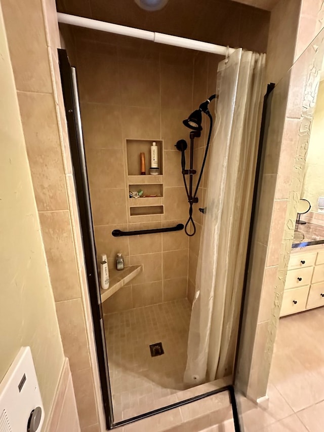 bathroom with a stall shower