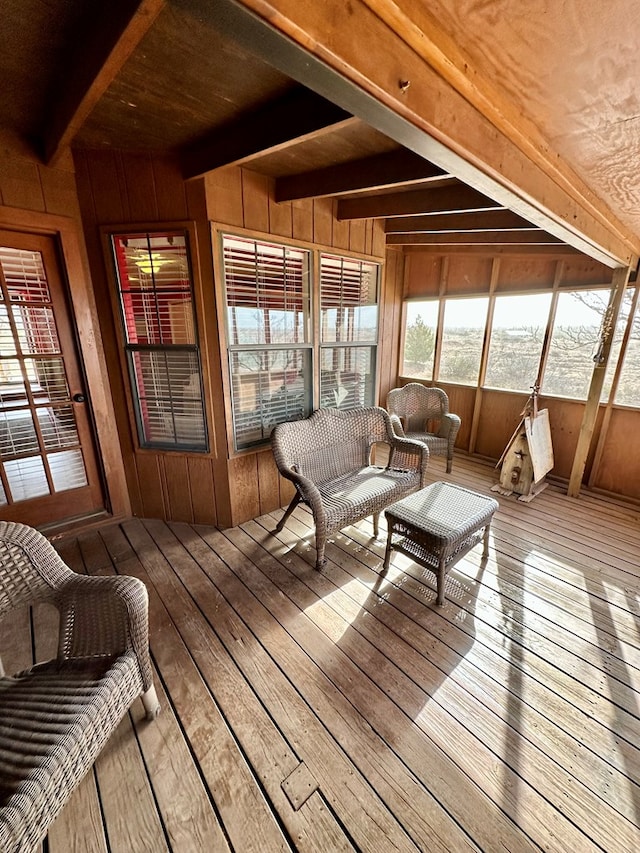 sunroom / solarium with beamed ceiling