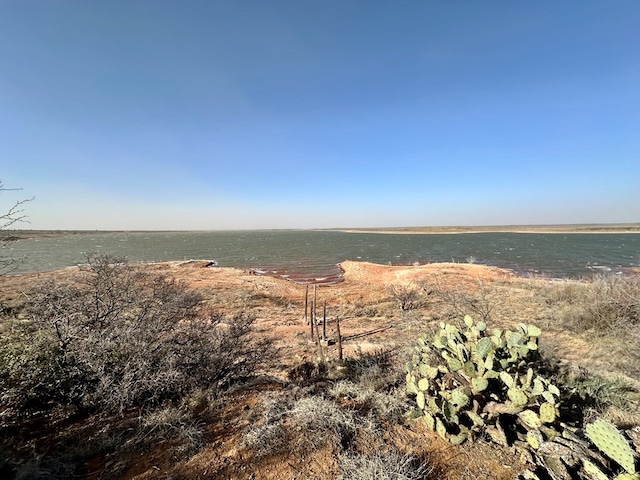 view of landscape with a water view