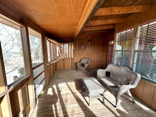 sunroom with wooden ceiling and beam ceiling