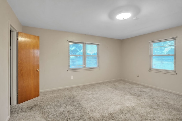 116 W Robinson Rd, Big Spring, TX 79720 - unfurnished bedroom with carpet floors and baseboards