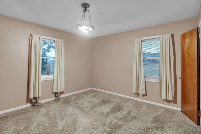 116 W Robinson Rd, Big Spring, TX 79720 - empty room featuring carpet and baseboards