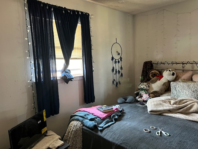 bedroom with a textured ceiling