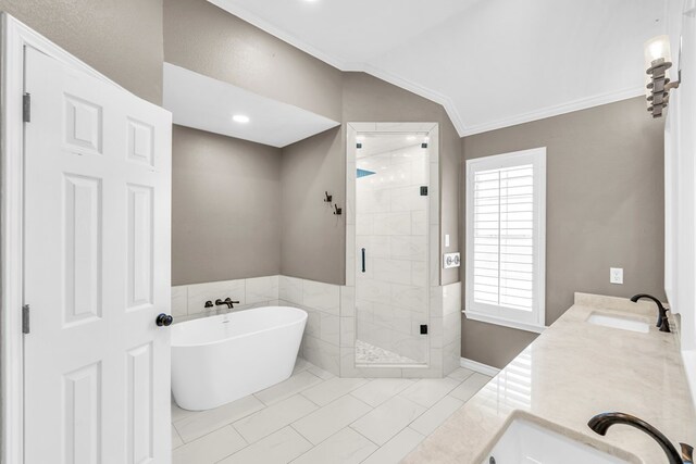 2201 Hereford Blvd, Midland, TX 79707 - full bathroom featuring crown molding, a soaking tub, a sink, and a stall shower