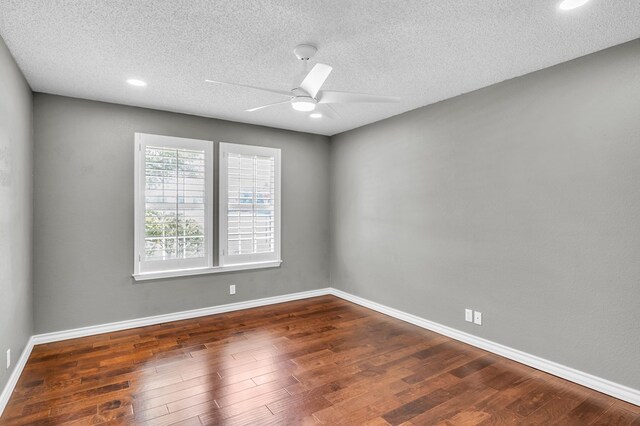 2201 Hereford Blvd, Midland, TX 79707 - empty room with wood finished floors, baseboards, ceiling fan, recessed lighting, and a textured ceiling