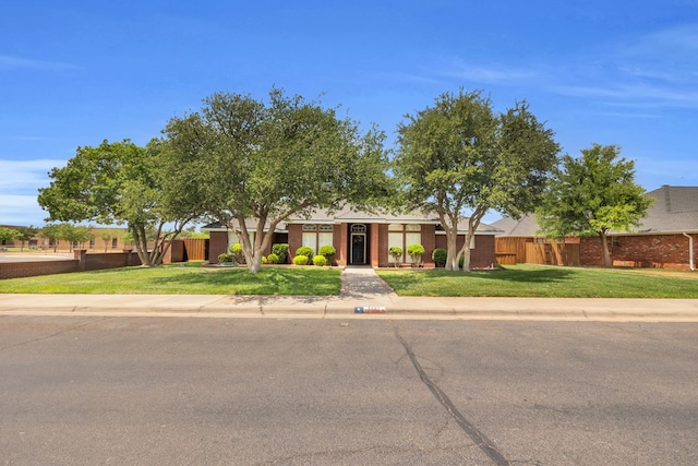 2201 Hereford Blvd, Midland, TX 79707 - single story home with fence and a front yard