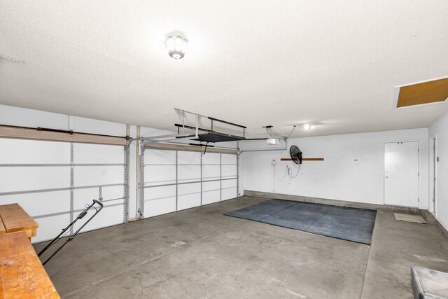 2201 Hereford Blvd, Midland, TX 79707 - garage featuring a garage door opener