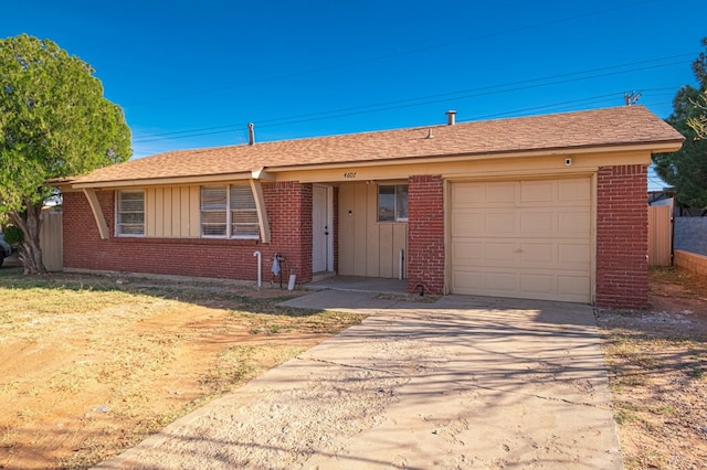 ranch-style house featuring a garage