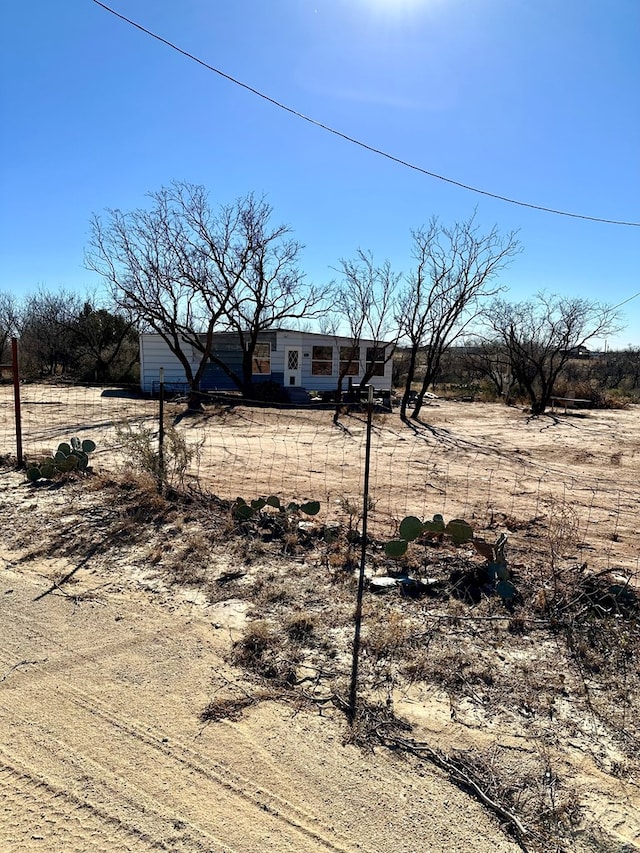 exterior space with a rural view