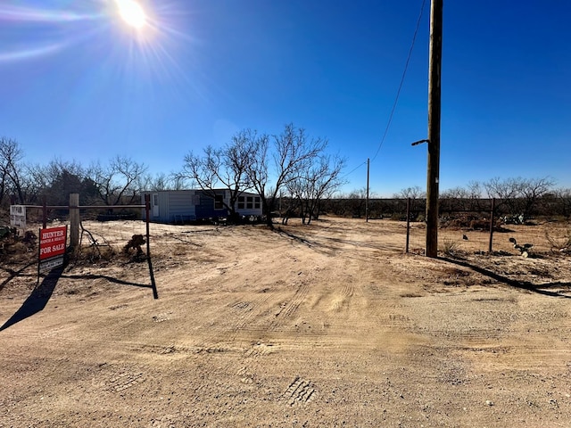 view of yard featuring a rural view