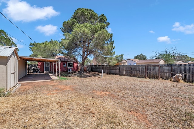2109 Holloway Ave, Midland, TX 79705 - fenced backyard with a patio area