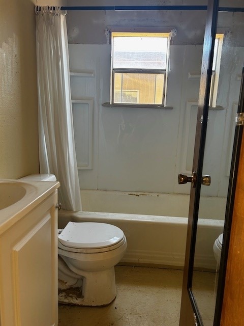 full bathroom with shower / bath combo, vanity, and toilet