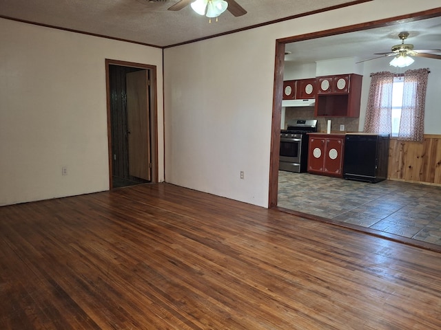 unfurnished living room featuring dark wood-style flooring, a textured ceiling, visible vents, ornamental molding, and a ceiling fan