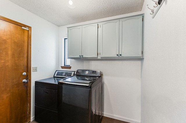3400 Dentcrest Dr, Midland, TX 79707 - laundry room featuring separate washer and dryer, cabinet space, a textured ceiling, and wood finished floors