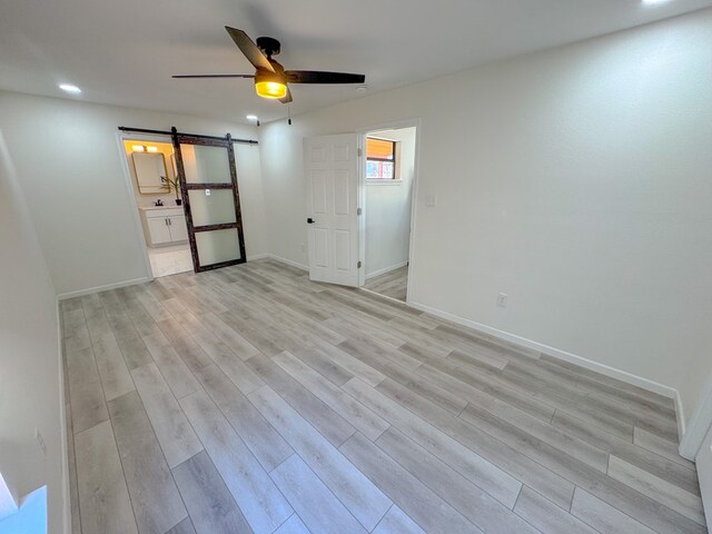 hall with light hardwood / wood-style flooring