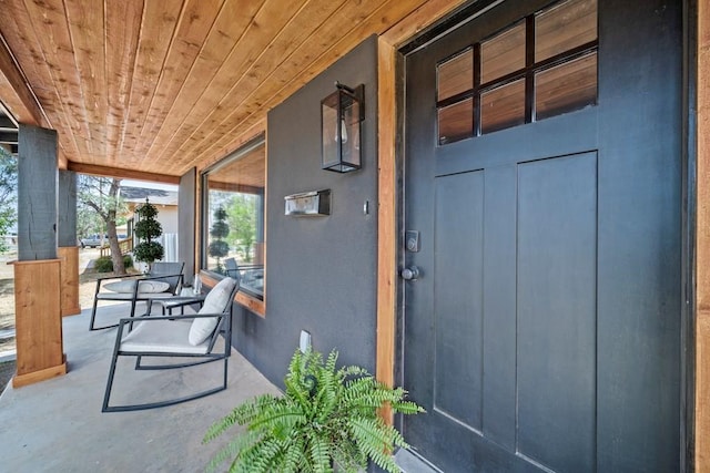 doorway to property with a porch