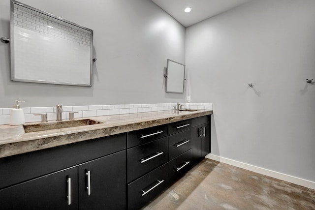 1 Lafayette Pl, Midland, TX 79705 - bathroom featuring double vanity and concrete floors