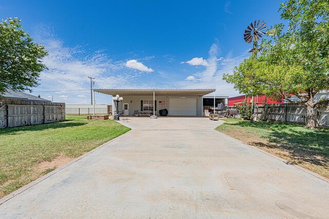 2108 S County Rd 1086, Midland, TX 79706 - view of front of home with driveway and an outdoor structure