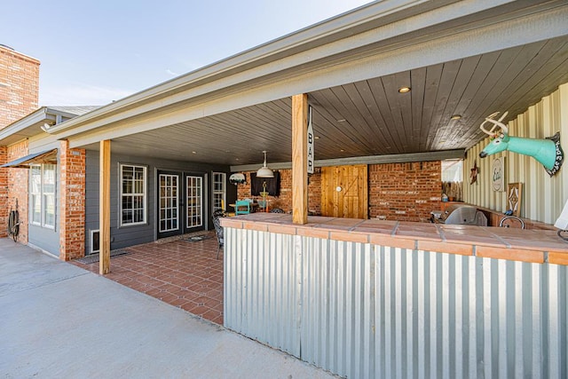 2108 S County Rd 1086, Midland, TX 79706 - view of patio / terrace featuring area for grilling and french doors