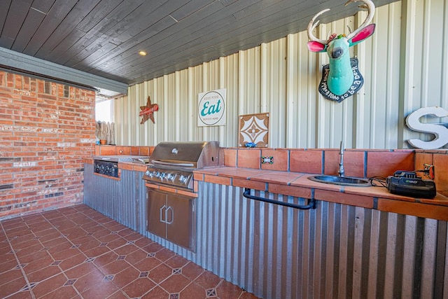 2108 S County Rd 1086, Midland, TX 79706 - view of patio with a sink and an outdoor kitchen