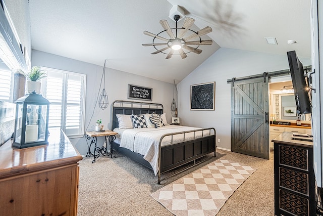 2108 S County Rd 1086, Midland, TX 79706 - bedroom featuring a barn door, light colored carpet, vaulted ceiling, a ceiling fan, and ensuite bath