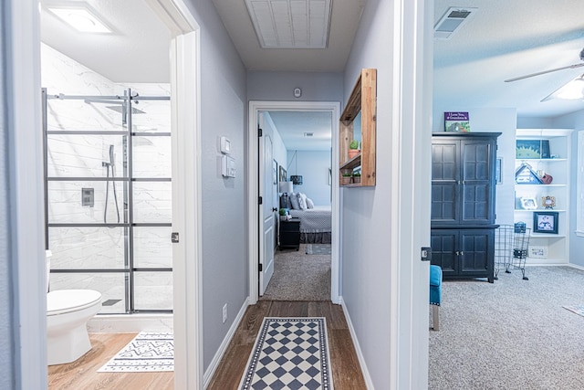 2108 S County Rd 1086, Midland, TX 79706 - hall featuring wood finished floors and carpet floors