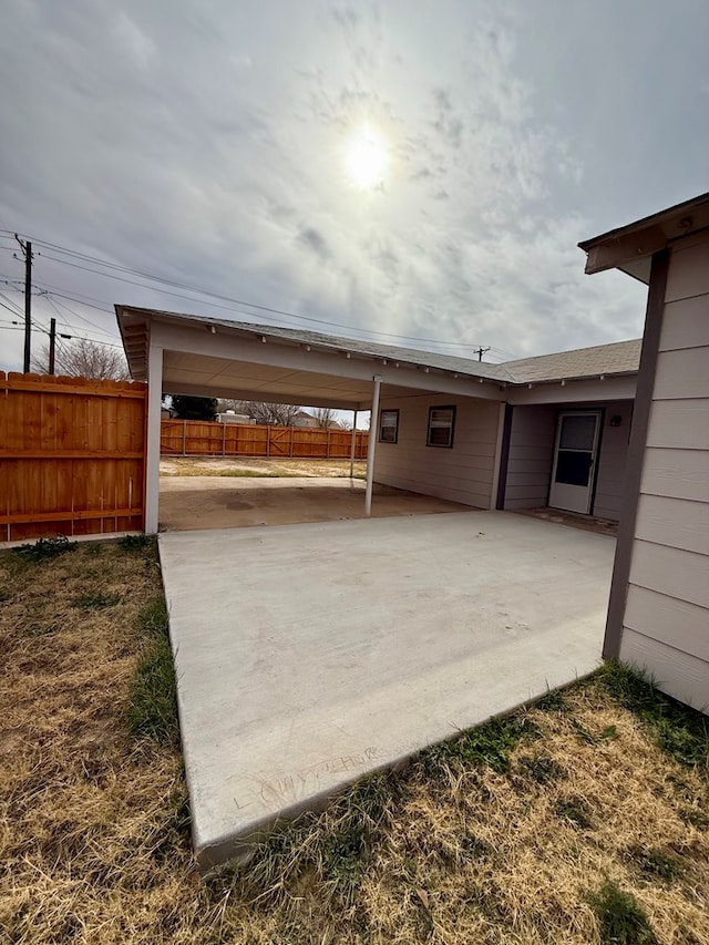 view of patio / terrace with a carport