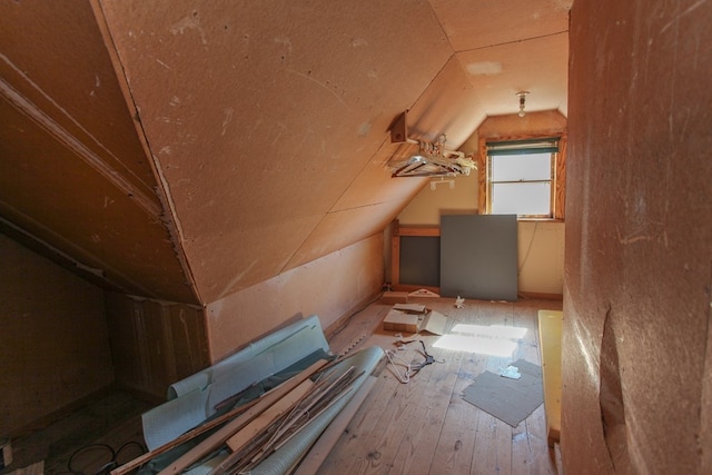 1004 E 15th St, Big Spring, TX 79720 - additional living space featuring vaulted ceiling and hardwood / wood-style floors