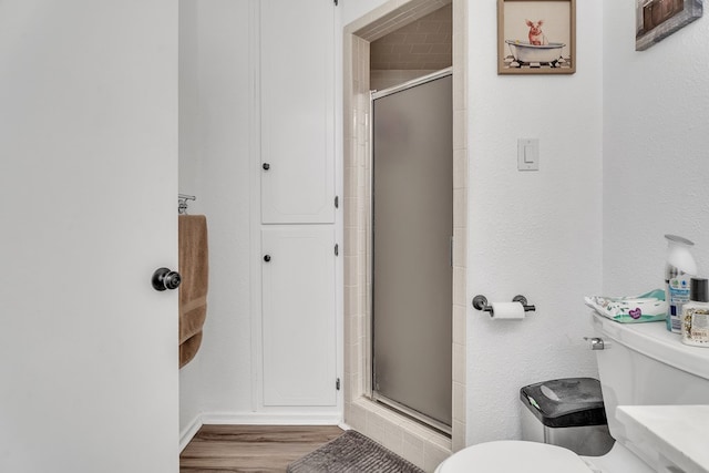 2108 Cecilia, Big Spring, TX 79720 - full bath featuring a shower stall and wood finished floors