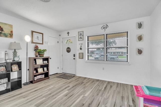 2108 Cecilia, Big Spring, TX 79720 - foyer featuring wood finished floors and baseboards
