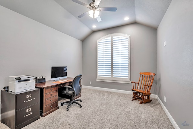 office area with ceiling fan, light carpet, and lofted ceiling