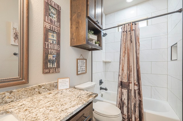 bathroom with shower / tub combo, vanity, and toilet