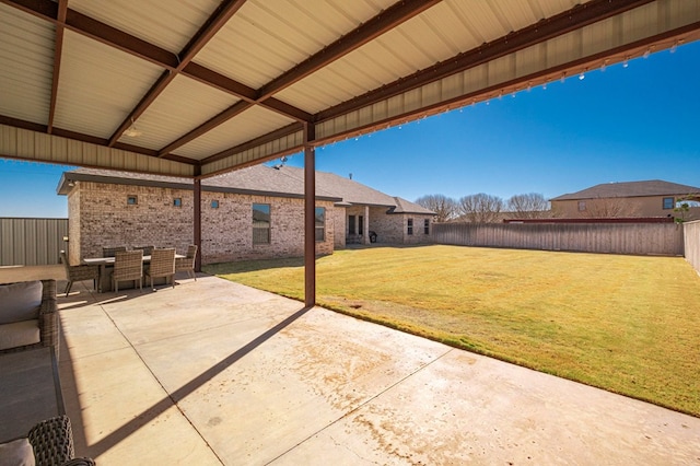 view of patio / terrace featuring outdoor dining space and a fenced backyard