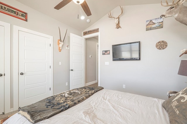 bedroom featuring vaulted ceiling and ceiling fan