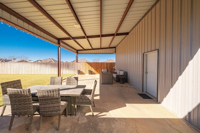 view of patio / terrace featuring outdoor dining area and a fenced backyard