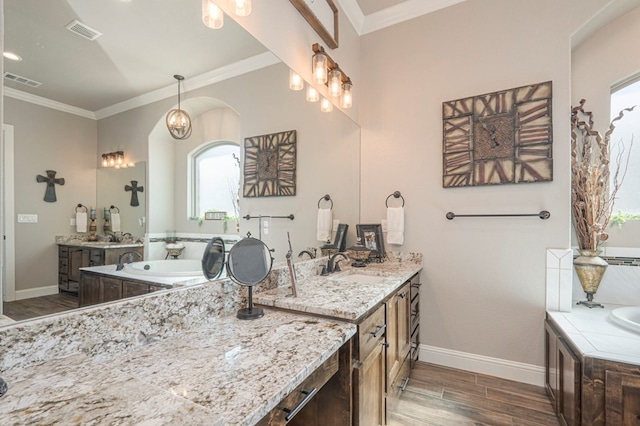 full bathroom with crown molding, a sink, visible vents, and wood tiled floor