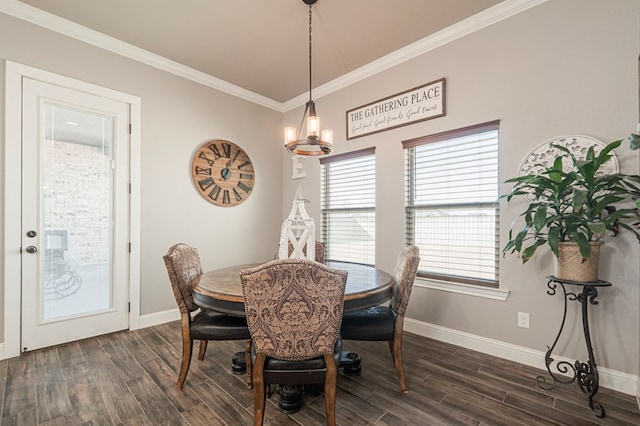 dining space with baseboards, ornamental molding, and dark wood-type flooring