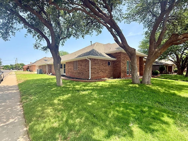 3612 Oakridge Dr, Midland, TX 79707 - view of front of house with brick siding and a front lawn