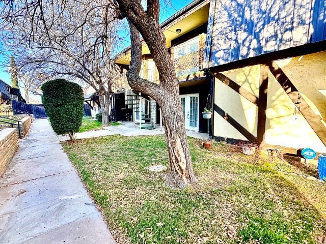 501 W Scharbauer Dr Unit 28, Midland, TX 79705 - exterior space featuring a patio and french doors