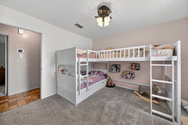 2608 Emerson Dr, Midland, TX 79705 - bedroom featuring carpet and a textured ceiling