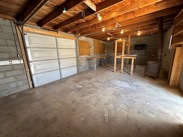 garage with concrete block wall