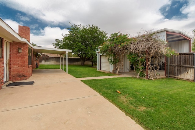 3300 Cambridge St, Odessa, TX 79761 - fenced backyard featuring a patio area and an outbuilding